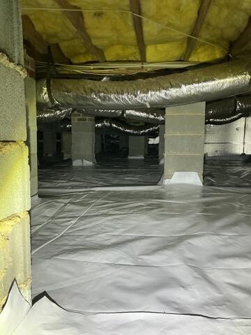 Vapor Barrier Installation Begins to Control Crawl Space Moisture | Raleigh, NC