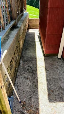 Eroding and Unlevel Concrete Sidewalk