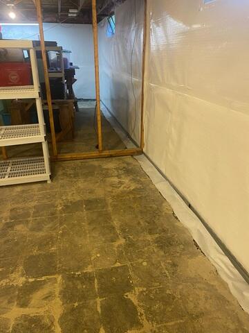 Basement Wall Seepage Channeled to Drainage System