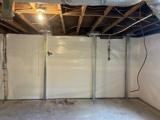 Steel I-Beam Installation to Permanently Stabilize Foundation Walls