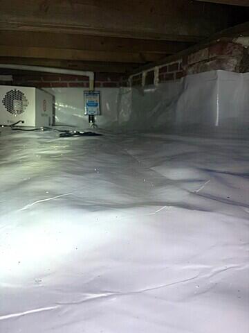 The Dehumidifier and Sump Pump Work Together to Get Moisture Out of the Crawl Space