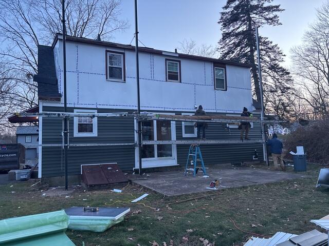 New Siding Goes On