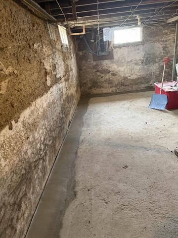 Beginning the Basement Waterproofing Installation