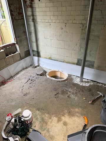 Support Jack Installation with Sump Pump Basin - Basement Stabilization (Jacksonville, FL)
