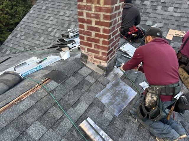New Flashing Is Installed on the Chimney