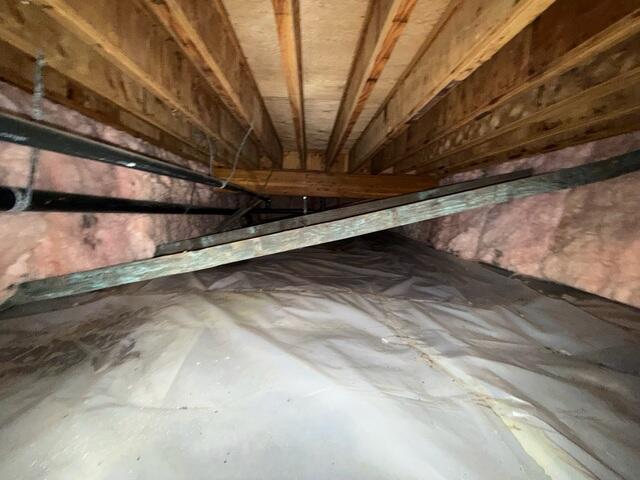 Before Installation - Damp, Musty Crawl Space