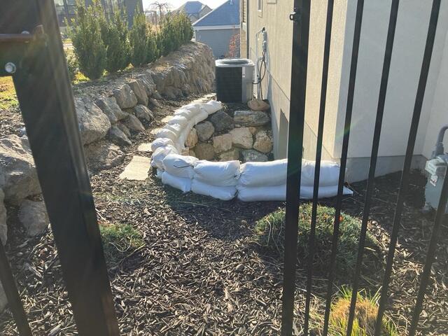 Temporary Sandbag Flood Protection Before Basement Waterproofing in Lehi, UT