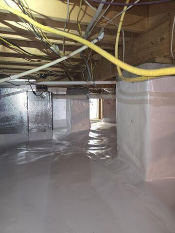 SilverGlo Insulation and Vapor Barrier Creating a Bright, Dry Crawl Space