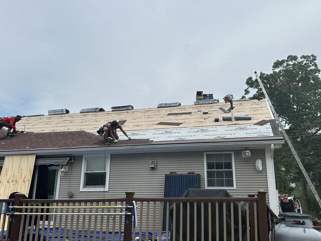 Installation of IKO Dynasty Shingles in Monaco Red