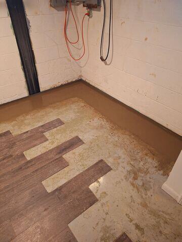 Interior Drainage System and CarbonArmor® Wall Reinforcement System Save Ottawa Lake, MI Basement