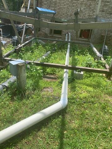 Buried Discharge Line Carrying Water Away