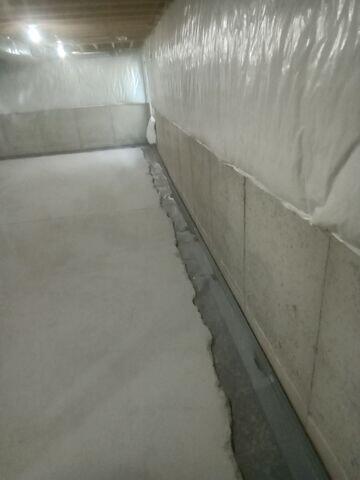 Interior Drainage System Surrounded with Stone and Protective Liner
