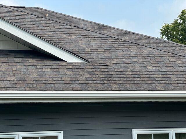 Front side of building damages shongles