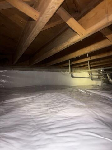 A Bright, White Finish Gives Your Crawl Space A Clean Look