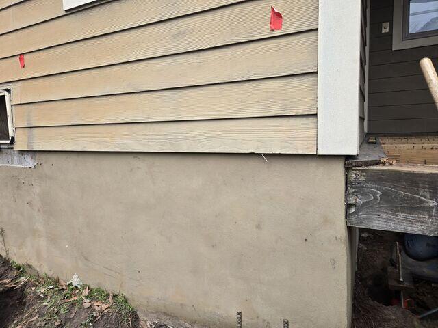 Slab Settlement Stabilized with Helical Piers