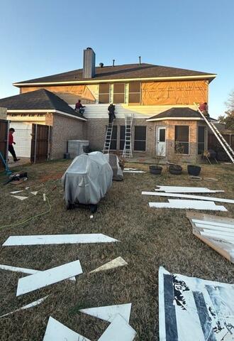 Full Siding Removal and Protective Membrane Installation Before New Siding