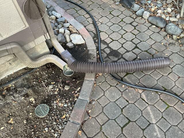 Downspout pooling near foundation - BEFORE