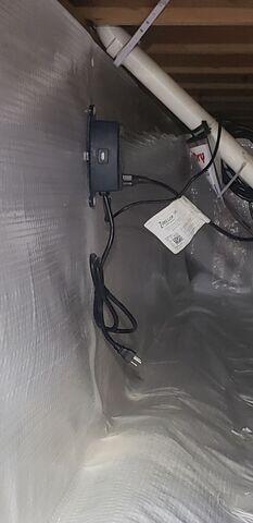 SuperSump Wall Port & Battery During Setup