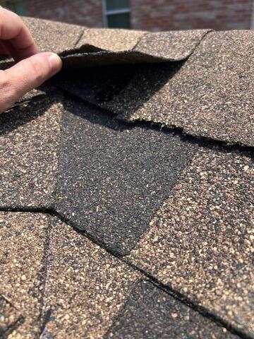 Roof Replacement in McKinney TX - Ridge Shingles Lifting