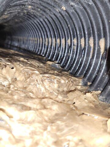 Drainage System Before WaterGuard (Clogged & Inefficient)