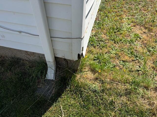 Gutter Downspout Before Photo
