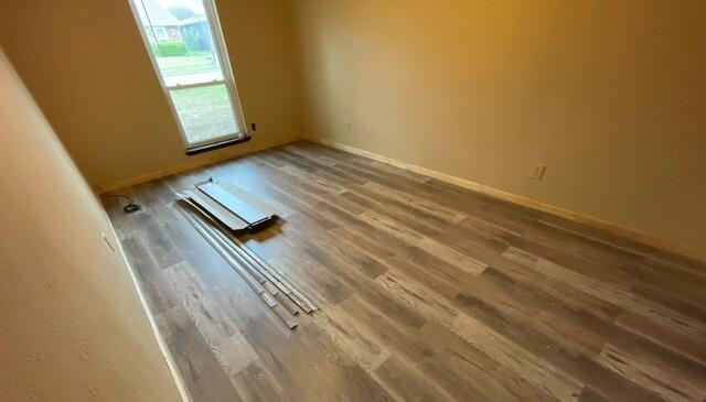 Laminate Flooring & Baseboard Installation - Water Damage Restoration in Plano, TX