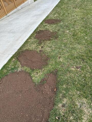 Yard Excavation Area for Pier Installation Being Repaired