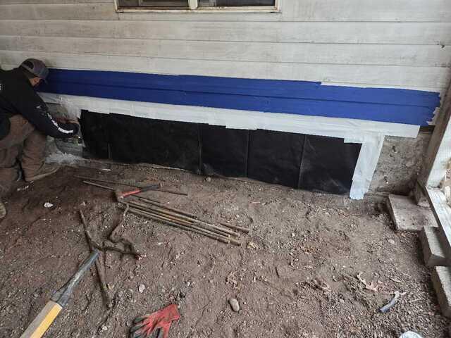 Placement of Vapor Barrier