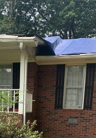 Storm Damage Tarping and Tree Removal