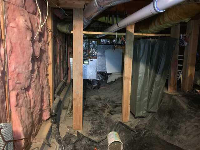 Before Photo of Dirty Crawl Space