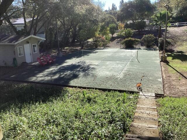 Sunken Tennis Court Before Concrete Leveling in Fallbrook CA