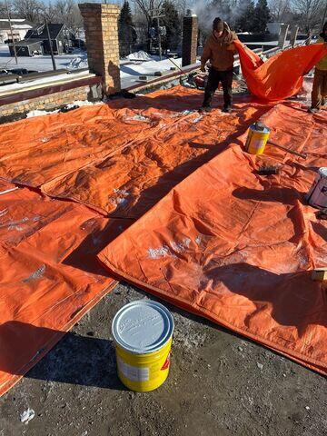 Tarping the roof