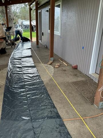 Preparing To Cut Holes For Push Pier Installation