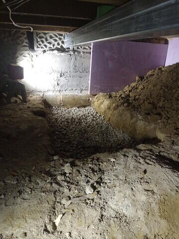 Gravel is added to the footing hole to distribute the weight through the soils.