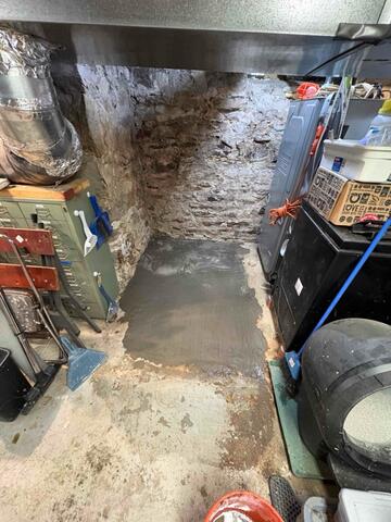 Radon Mitigation System with Bubbler Prep Installed in Oxford Farmhouse