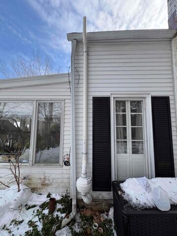 Radon Mitigation System with Bubbler Prep Installed in Oxford Farmhouse