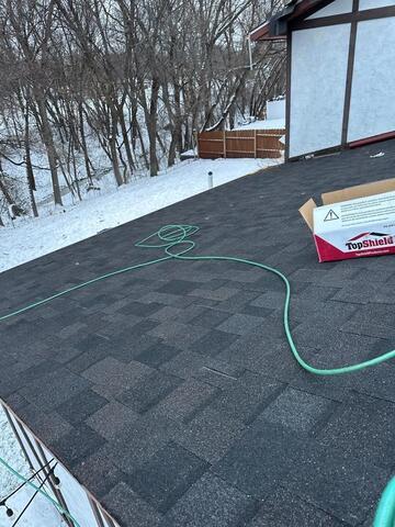 New Asphalt Shingles Installed