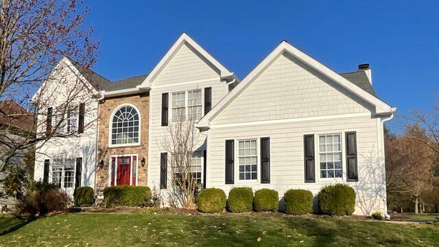New siding, windows, gutters, and shutters
