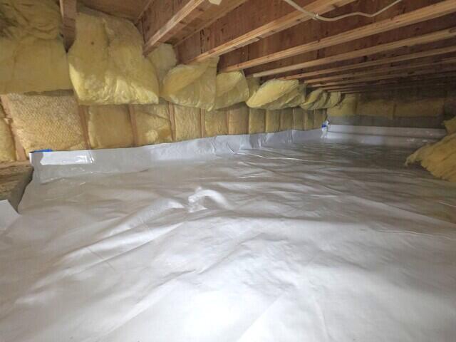 Insulation temporarily raised for proper CleanSpace© encapsulation installation