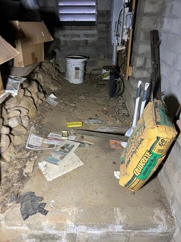 Malibu, CA Crawlspace Before Encapsulation - Debris and Unsealed Ground Conditions