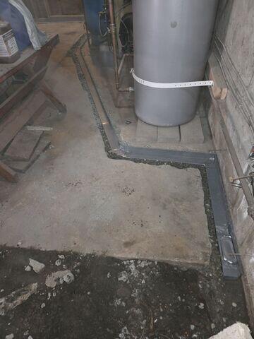 WaterGuard basement drainage installation in progress