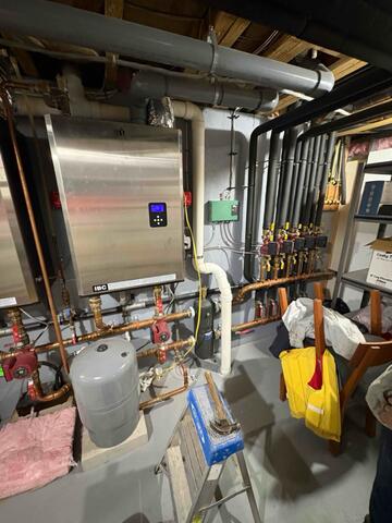 Radon mitigation pipe routed through mechanical room