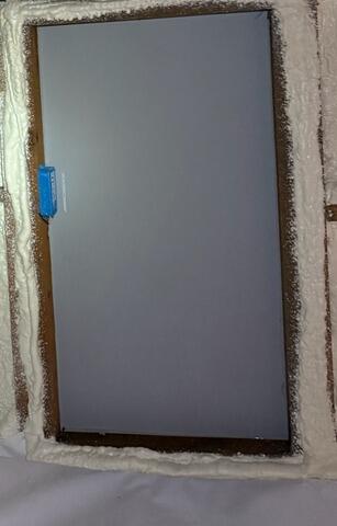Spray Foam Around Interior of EverLast Door