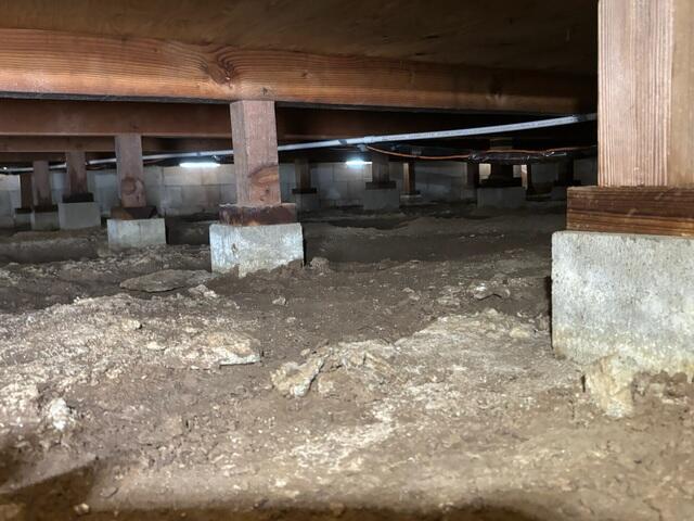 Open Dirt Crawl Space Before Vapor Barrier Installation