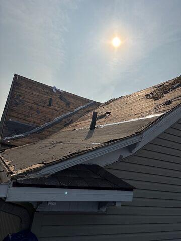 Asphalt roof removal