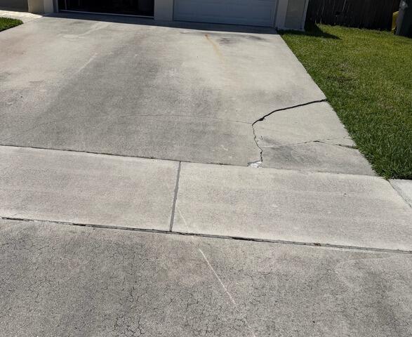 Concrete Driveway Settlement Damage