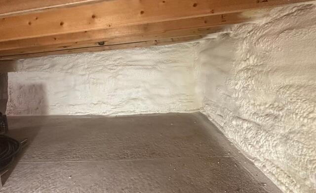 The crawlspace walls in a Lake Harmony home have been spray-foamed for improved comfort.