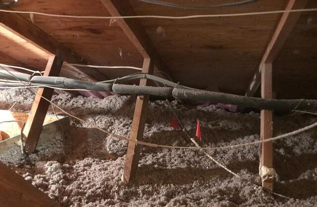 The attic was insulated with blown-in insulation for comfort.