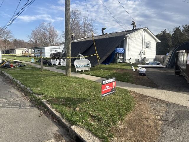 Shingle Removal Begins