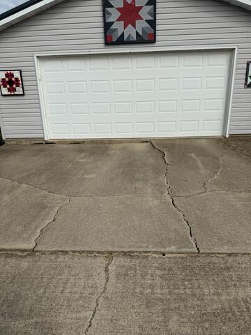 Majorly Cracked and Unleveled Driveway